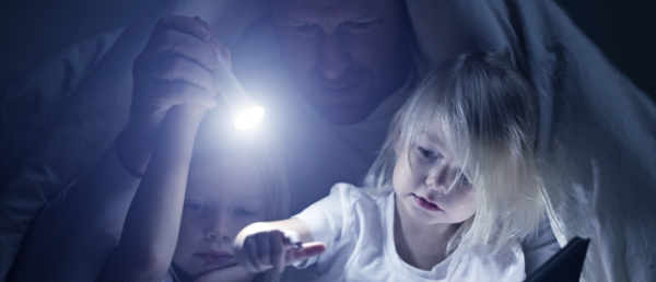 Father with daughters during a power outage