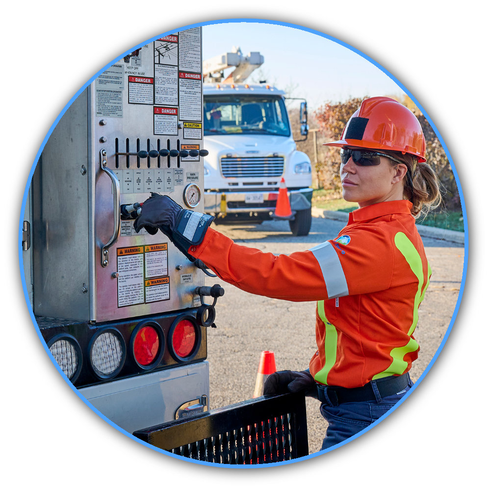 Burlington Hydro Lines Department team member at the controls